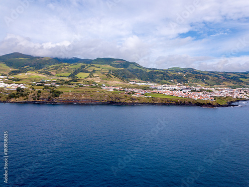 Aerial view on city Mosterios on island Sao Miguel, the Azores. Beautiful small town in Portugal. Azores islands. photo