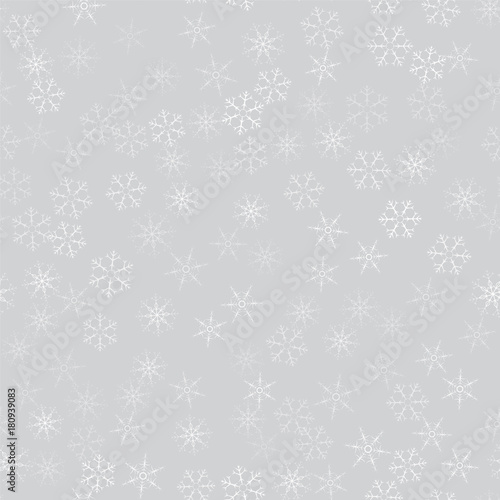 abstract seamless pattern of snowflakes. Christmas background for design of posters, postcards, invitation for the new year.