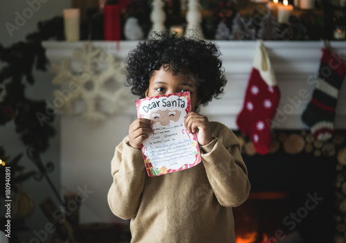 Kid with Christmas wishlist