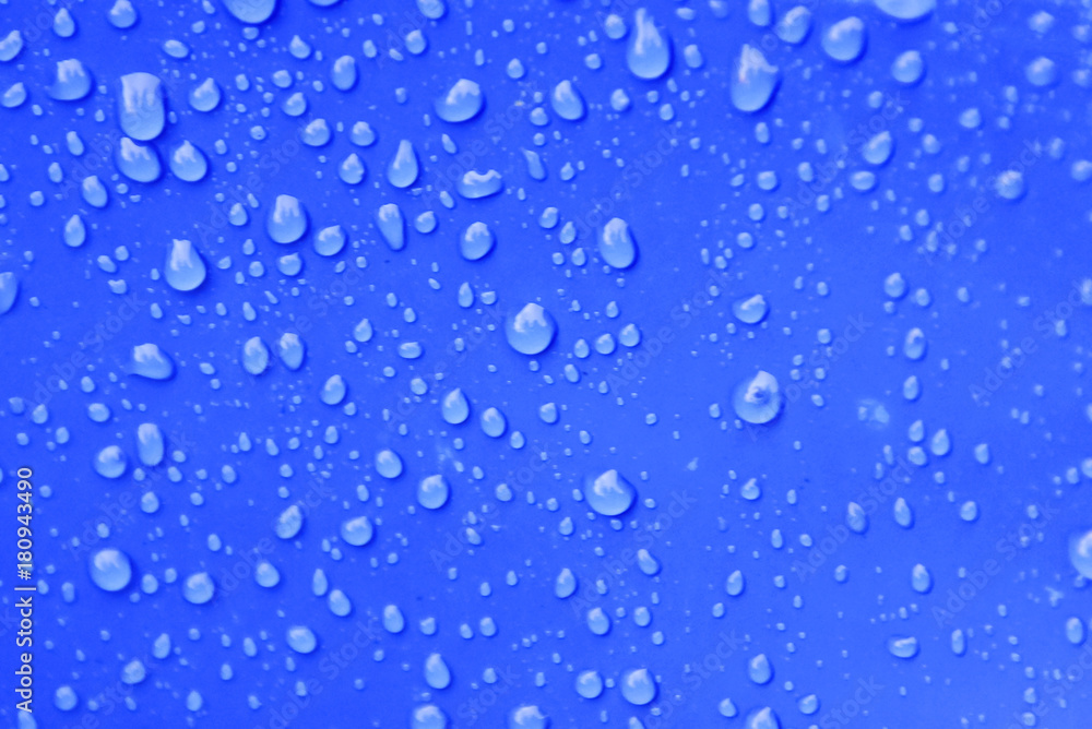 Water Drops Over Blue Background