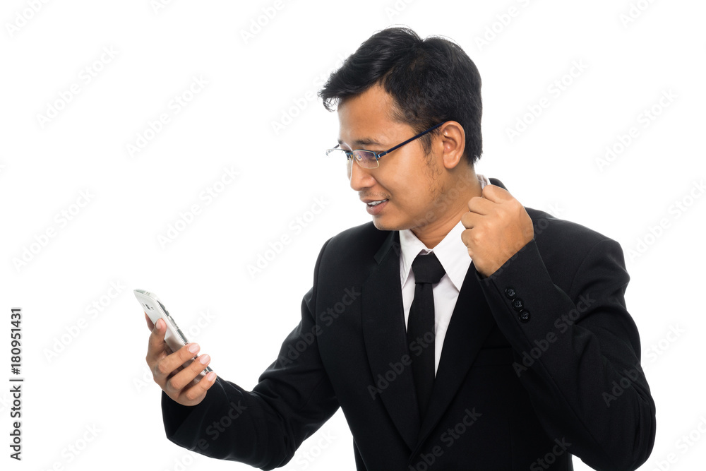Portrait of a business man with glasses and smart phone celebrating success. Isolated on white background Portrait of a business man with glasses and smart phone celebrating success. Isolated on white background