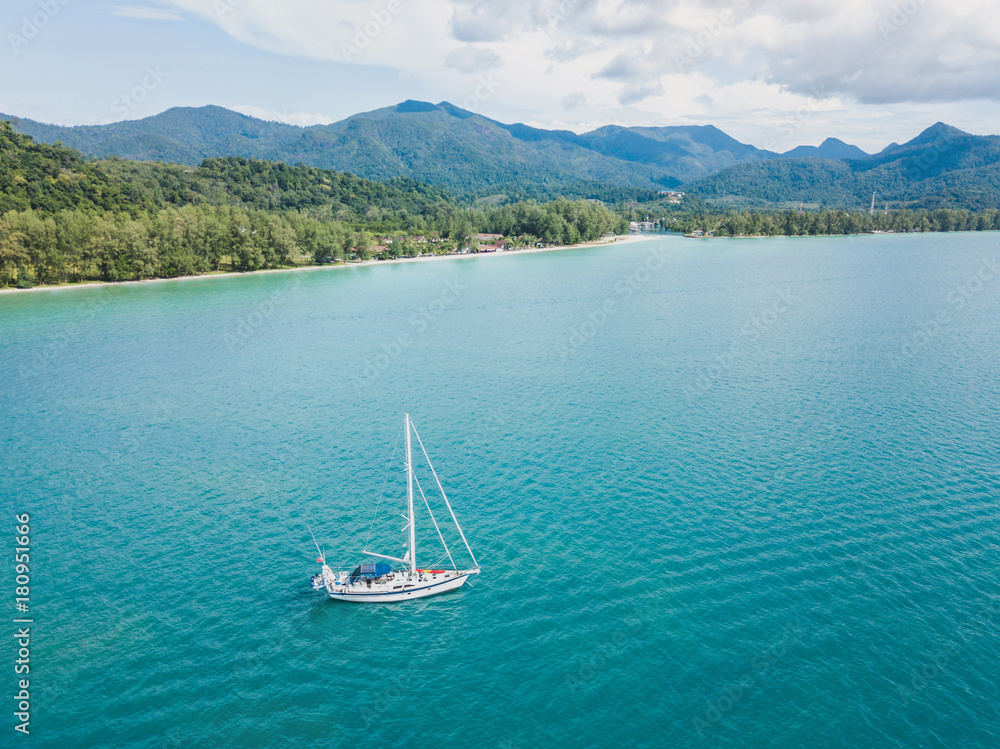 sailing boat near Koh Chang island in Thailand, beautiful aerial paradise beach landscape from drone