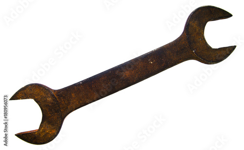 Old rusty wrench on white background