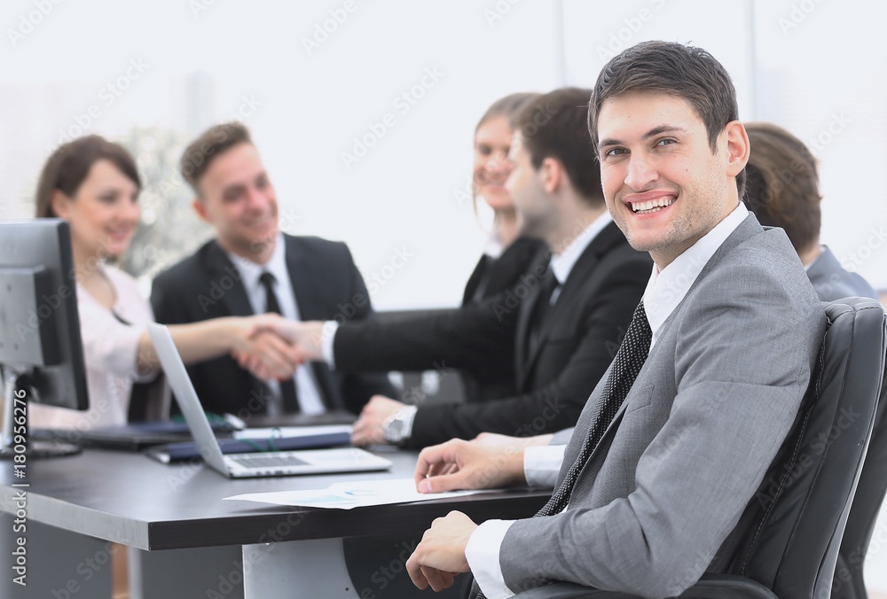 lawyer on the background of business partners handshaking lawyer on the background of business partners handshaking