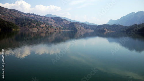 lakeside in Pokhara with the fishing net with mountain range