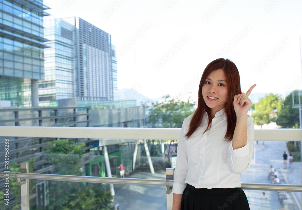 office woman point with the skyscrapers downtown background office woman point with the skyscrapers downtown background