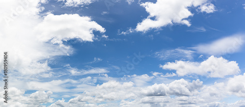 Panoramic white fluffy cloud in the blue sky © Singha songsak