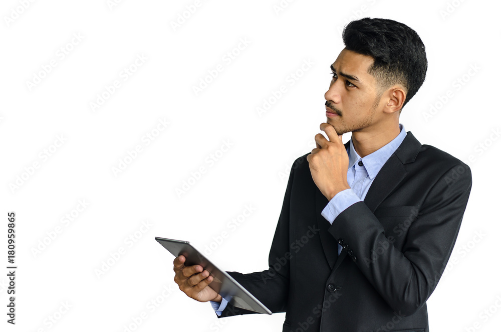 Handsome young asian businessman with tablet communicating isolated on white background Handsome young asian businessman with tablet communicating isolated on white background