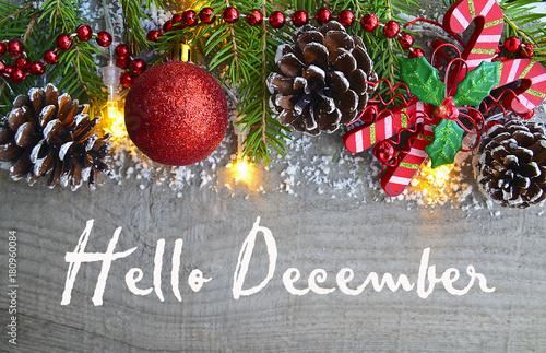 Hello December.Christmas decoration on old wooden background.Winter holidays concept.Selective focus. photo