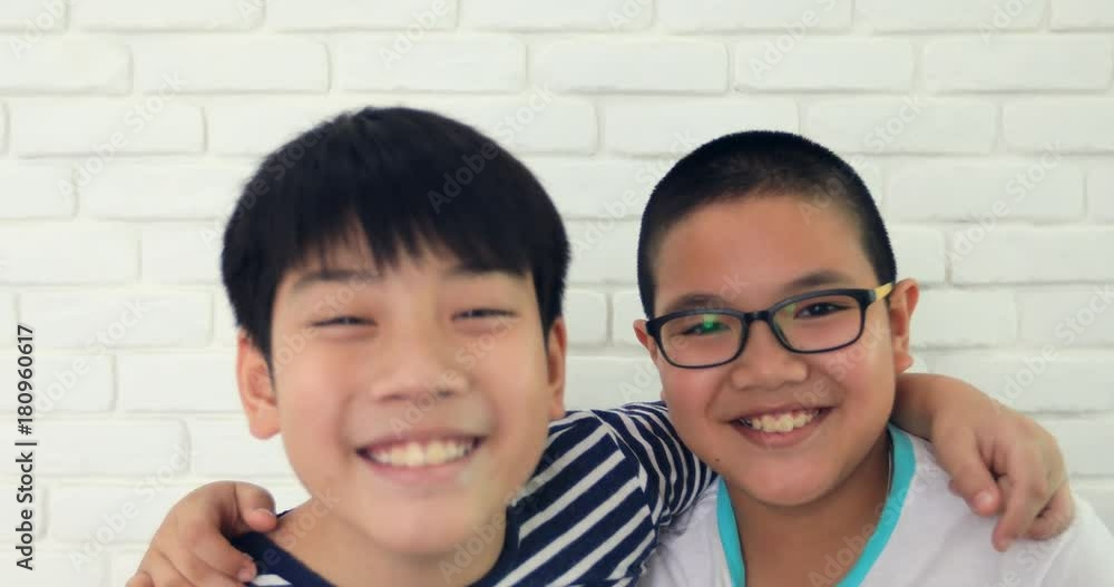 Portrait of young asian child with acting smile angry on your face. Portrait of young asian child with acting smile angry on your face.