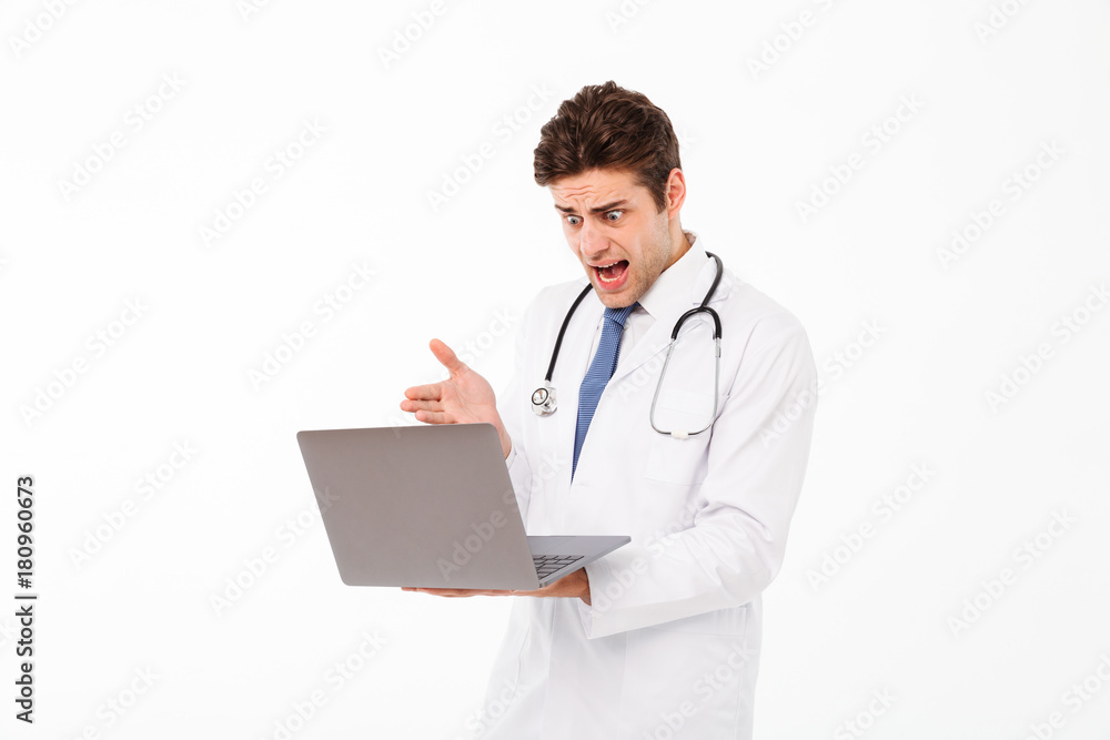 Portrait of a young male doctor with stethoscope Portrait of a young male doctor with stethoscope