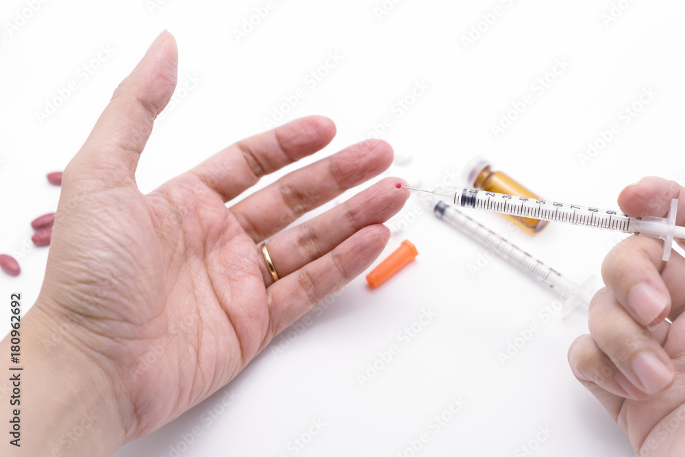 Bleeding medical personnel finger from needle stick injury accident