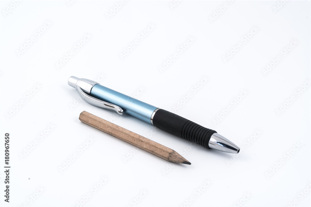 a ballpoint pen and a pencil on a white background a ballpoint pen and a pencil on a white background
