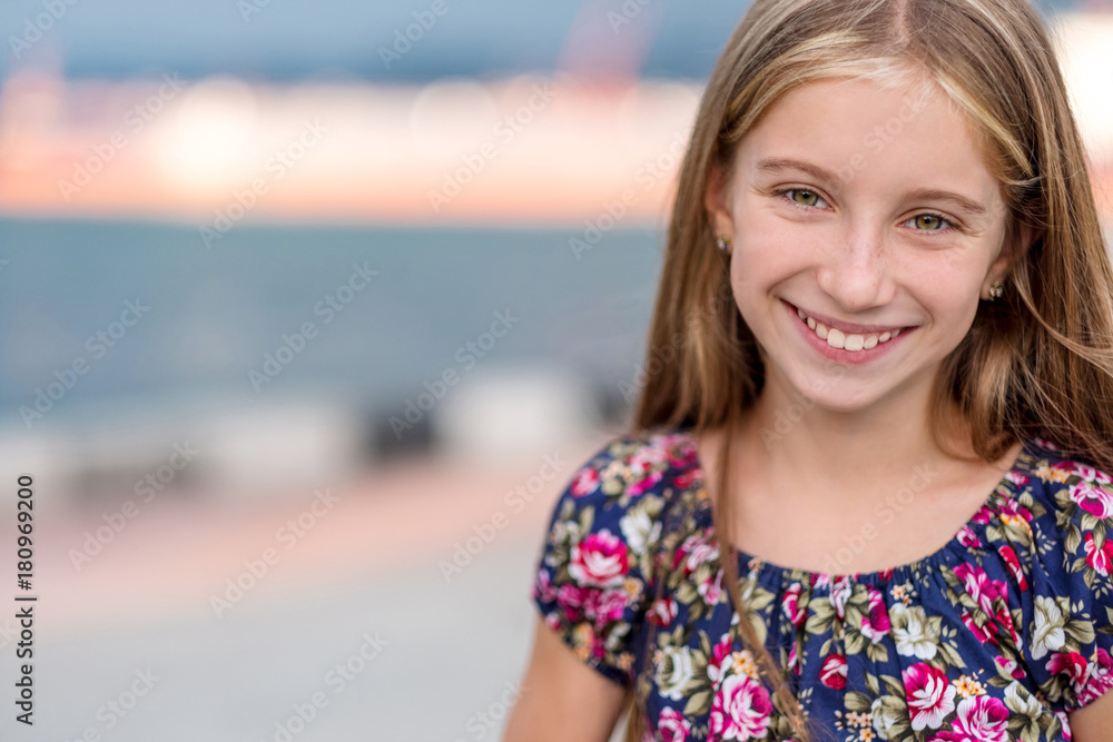 Portrait of cute smiling little girl, summer outdoor
