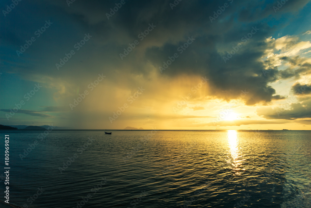 Fisherman boat with sunset scene in koh phangan. Horizontal image.