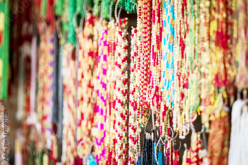 Colorful strings beads on street market