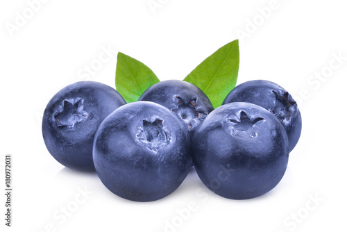 blueberries with green leaves isolated on white background