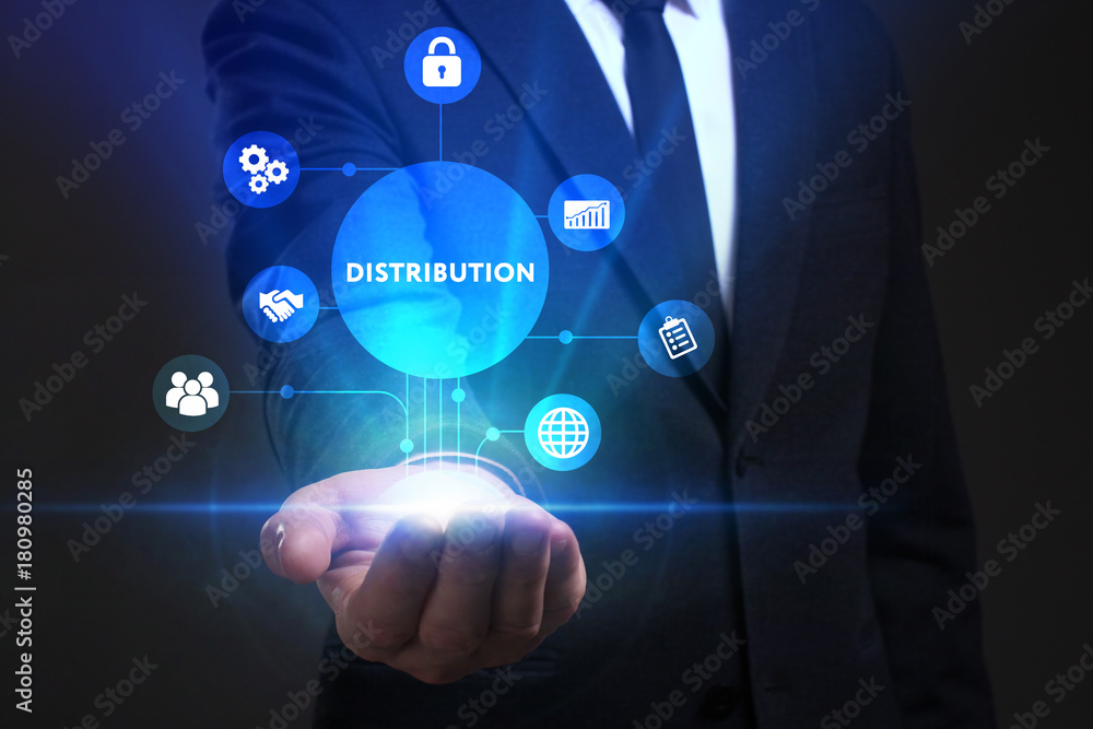 Business, Technology, Internet and network concept. Young businessman working on a virtual screen of the future and sees the inscription: Distribution Business, Technology, Internet and network concept. Young businessman working on a virtual screen of the future and sees the inscription: Distribution