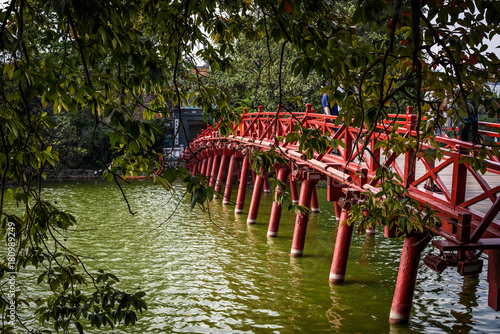 The red bridge to Ngoc Son temple Hanoi, Vietnam photo