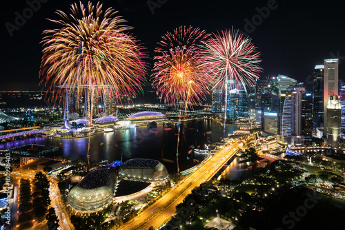 Photography Aerial view of Fireworks celebration over Marina bay in Singapore