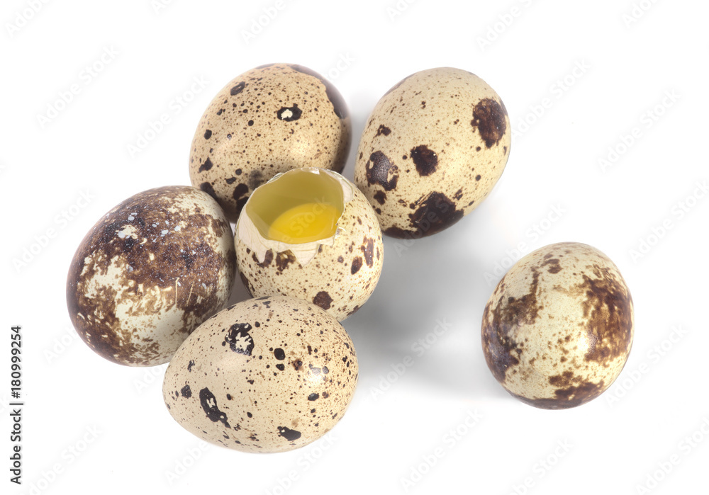 quail eggs one is broken yolk is seen. quail eggs one is broken yolk is seen.