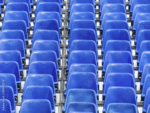 tribune with blue chairs