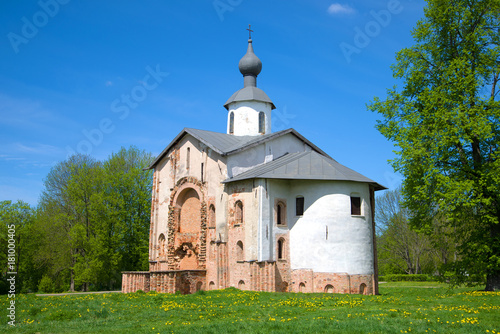 Medieval church in honor of sacred Paraskev Fridays on Yaroslav's Court in the sunny May afternoon. Veliky Novgorod, Russia