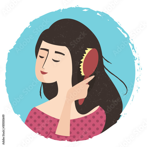 Girl is combing her hair with brush.