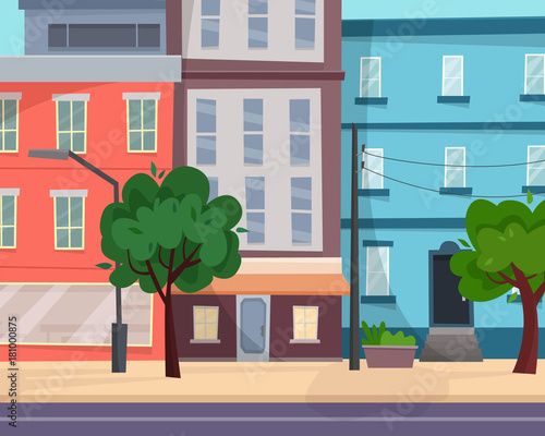 Houses on street with road in city. Cityscape.
