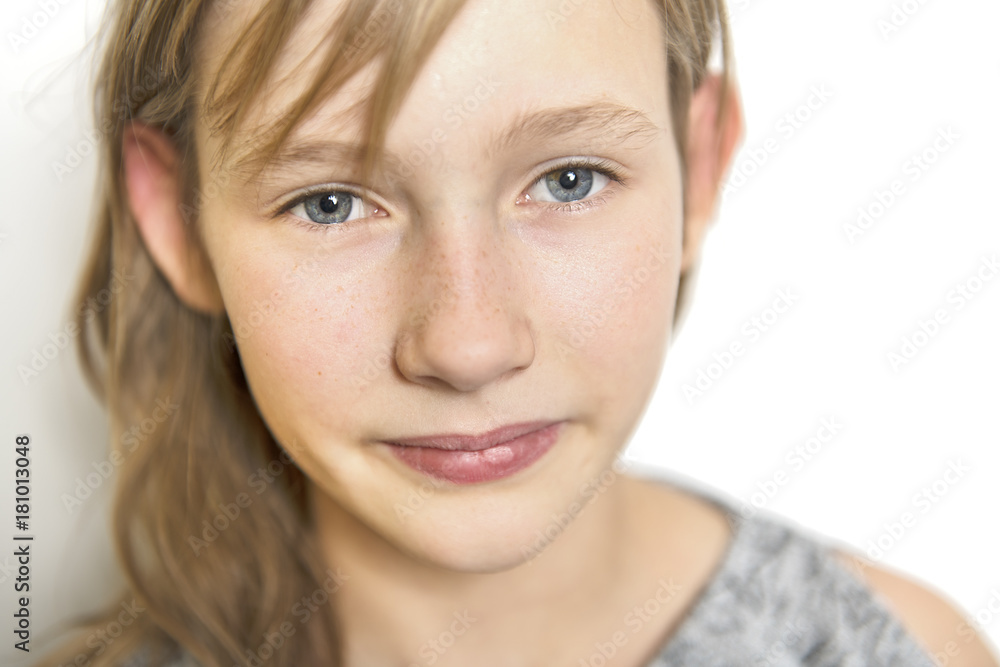 cute cheerful little girl portrait, isolated on grey background red head cute cheerful little girl portrait, isolated on grey background red head