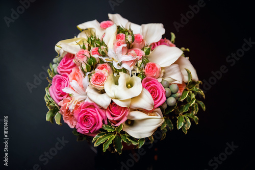 Beautiful wedding bouquet on a dark background