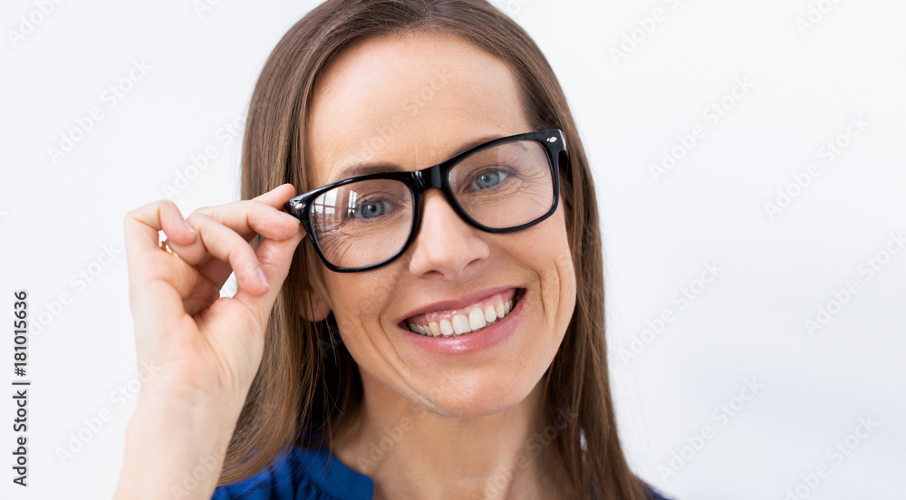 close up of smiling middle aged woman in glasses close up of smiling middle aged woman in glasses