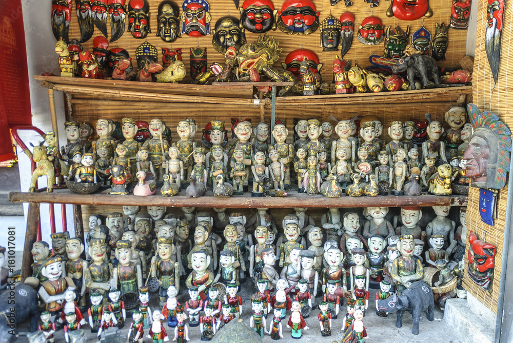 dolls and masks to the sale in the temple of the literature, ancient university, in Hanoi, Vietnam.