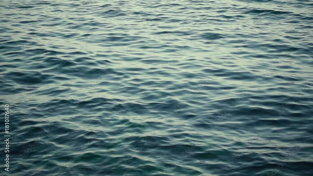 Slow motion movement of water surface ripples and waves Slow motion movement of water surface ripples and waves