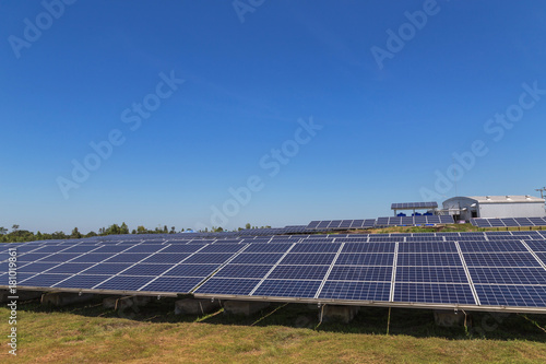 Close up rows array of polycrystalline silicon solar cells in solar power plant turn up skyward absorb the sunlight from the sun use light energy to generate electricity
