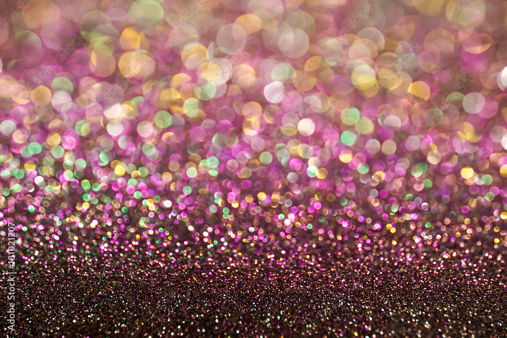 colorful pastel purple pink green bokeh light glitter background for Christmas and New Year's day