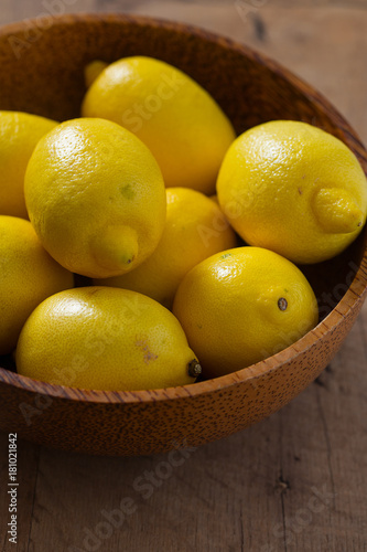 lemons on wooden surface