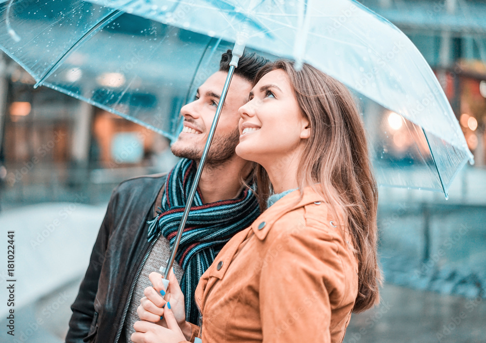 romantic couple in rainy season