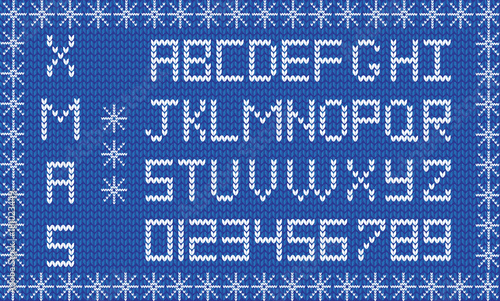 Knit new year or christmas alphabet framed with snowflakes. New year navy blue background with white knitted alphabet. Fabric Christmas or New Year script. Vector knit font, signs, symbols, numerals.