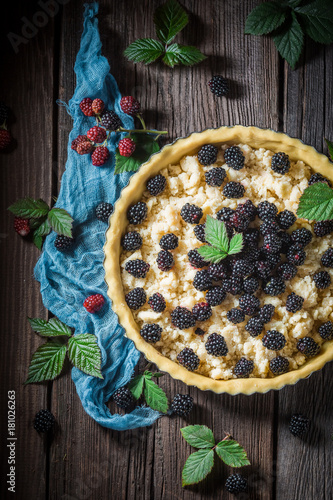 Tasty and sweet tart with blackberries with caster cugar