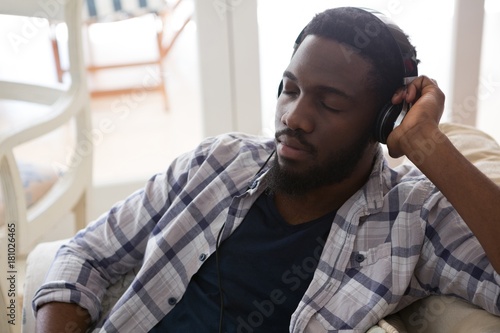 Man sleeping while listening to music