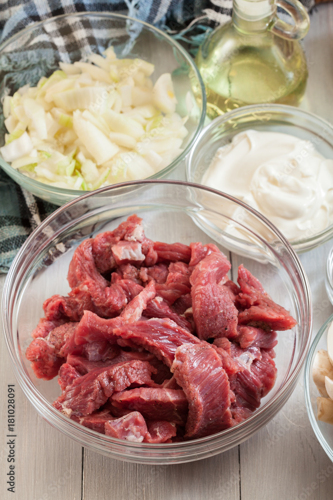 Beef and other ingredients ready to cooking beef Stroganoff