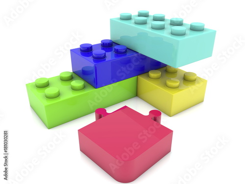 Puzzle piece near toy bricks