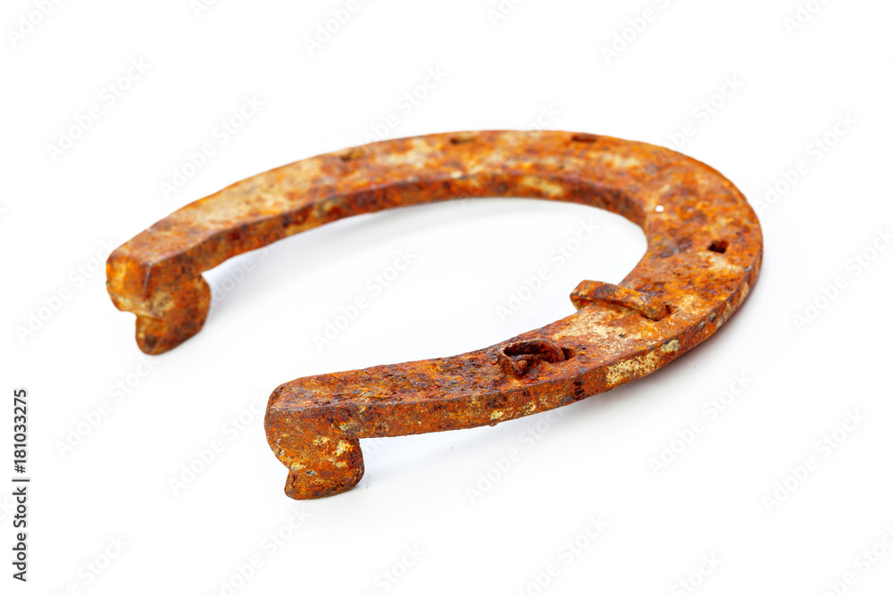 Old rusty horseshoe isolated on white Old rusty horseshoe isolated on white