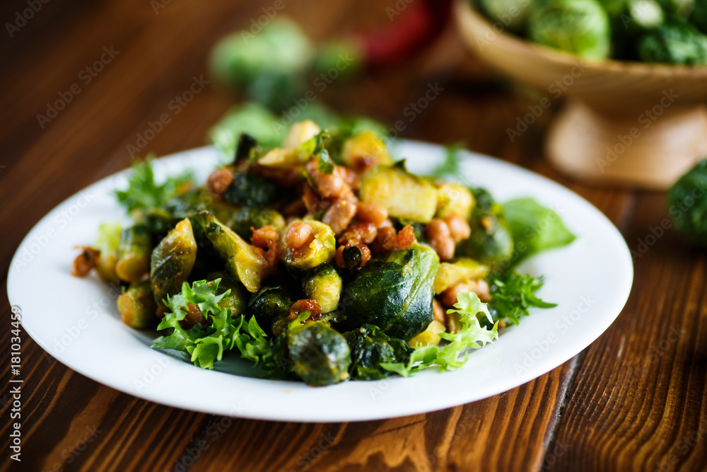 Brussels sprouts fried with beans close-up Brussels sprouts fried with beans close-up