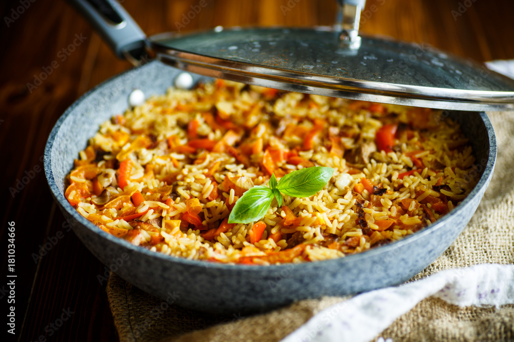 Pilaf with beef, carrots, onions, garlic, pepper and cumin. Pilaf with beef, carrots, onions, garlic, pepper and cumin.