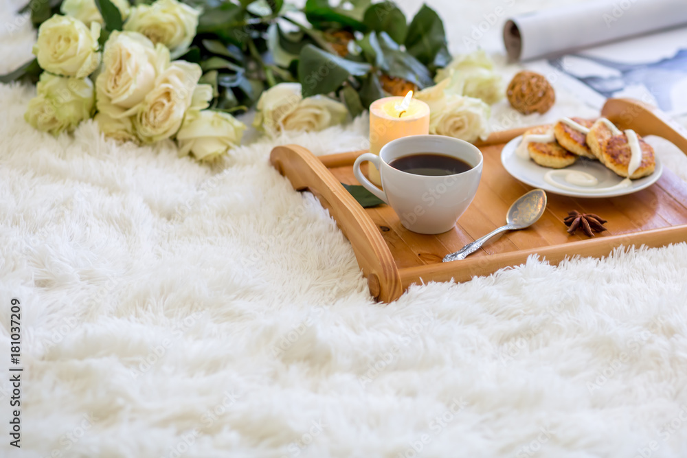 Breakfast. Lunch. Pancakes with cream. Candle and coffee. Cup of coffee with pankaces Breakfast. Lunch. Pancakes with cream. Candle and coffee. Cup of coffee with pankaces