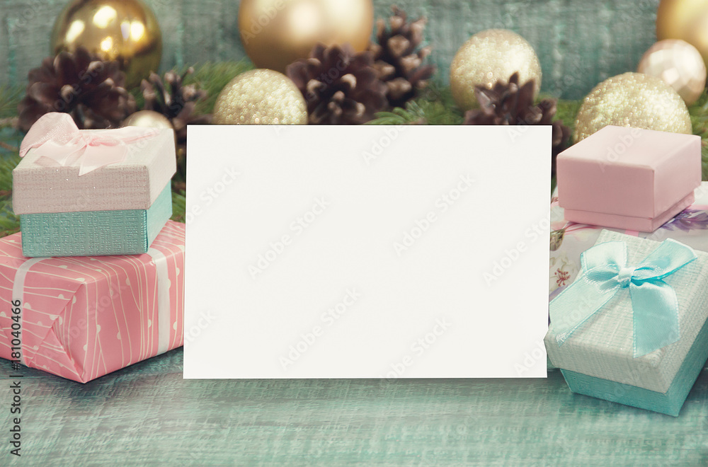 Fototapeta premium Christmas Gift Box and decorative ornaments on wooden background and blank with copy space. Xmas card