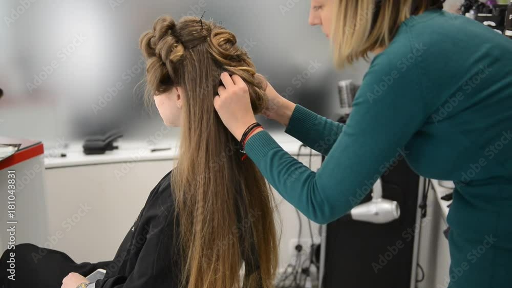 Beautiful brunette in beauty salon and hairdresser Beautiful brunette in beauty salon and hairdresser