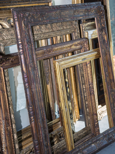 Stack of Golden Wooden Vintage Frames, Indoors